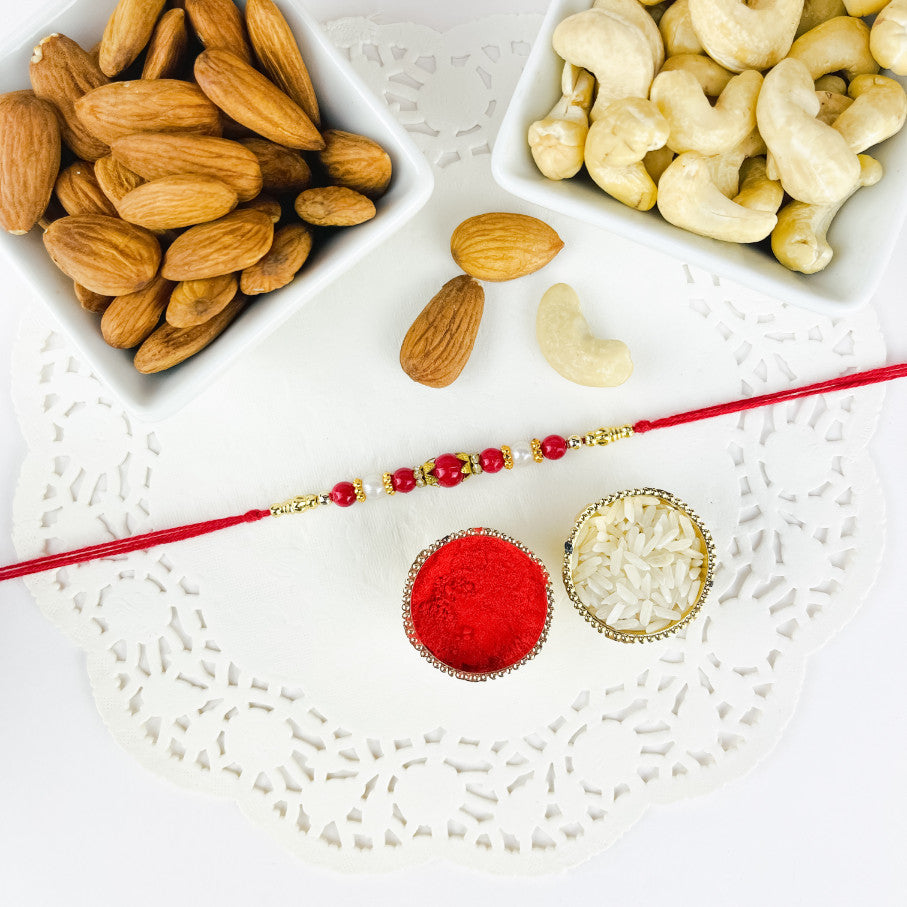Red Beads Rakhi With Dry Fruit Combo
