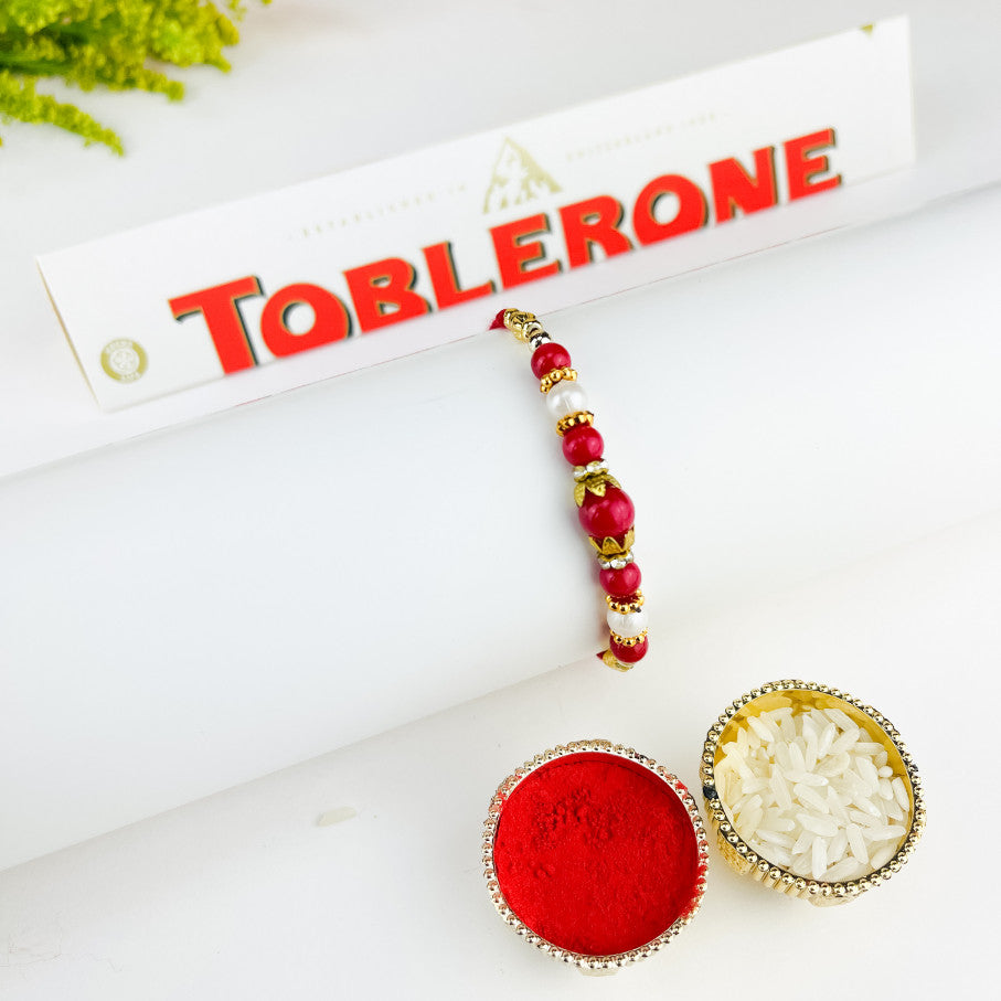 Red Beads Rakhi With Toblerone