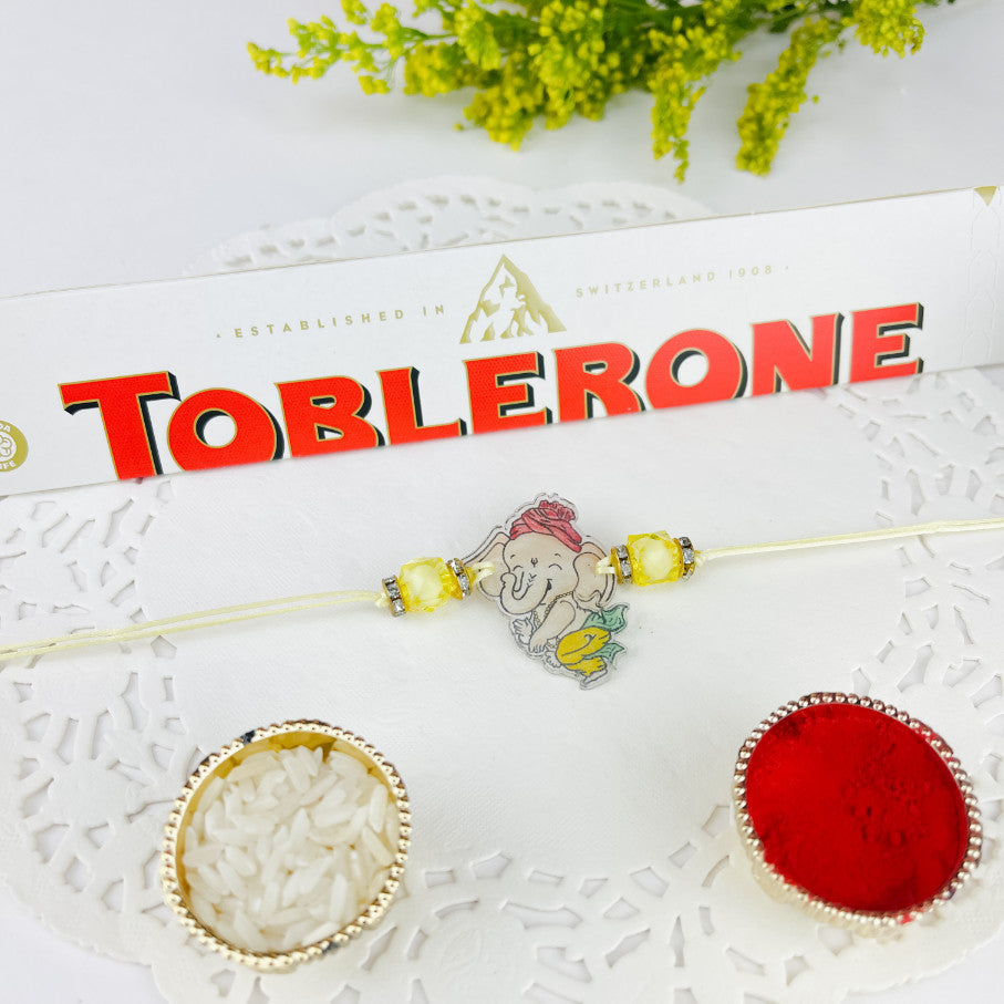 Kids Ganesh Rakhi With Toblerone